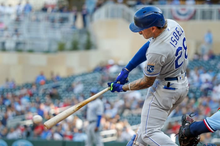 Sep 12, 2021; Minneapolis, Minnesota, USA; Kansas City Royals center fielder Kyle Isbel (28) hits an RBI single against the Minnesota Twins in the eighth inning at Target Field. Mandatory Credit: Bruce Kluckhohn-USA TODAY Sports